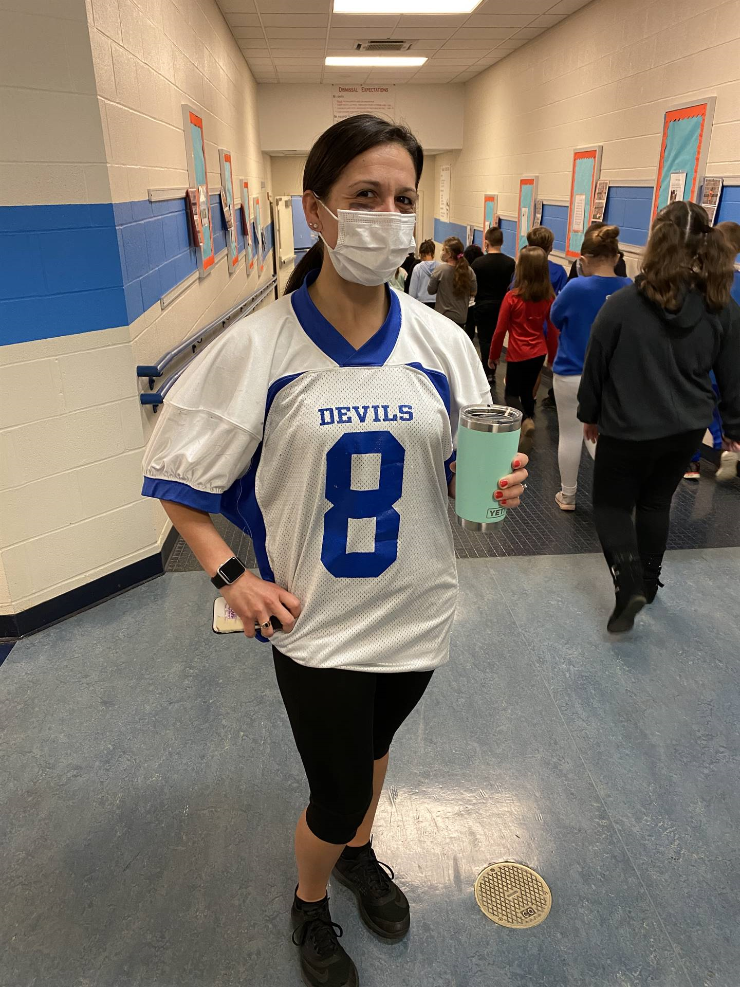 School Staff Member in Blue Devils Jersey